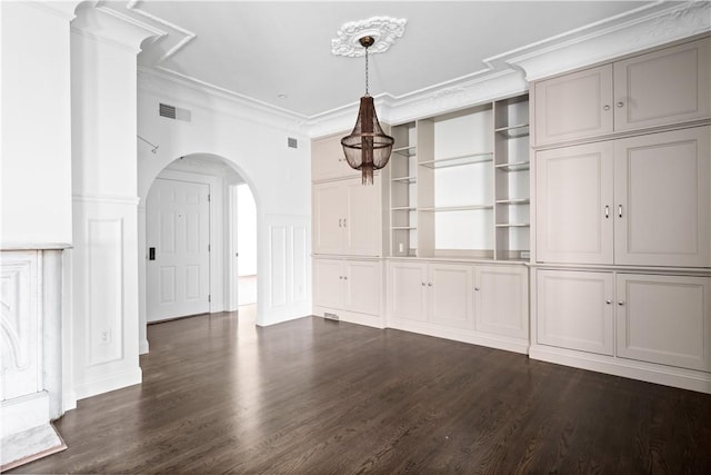 157 Waterman St Unit 2-5, Providence, RI 02906 - unfurnished dining area featuring dark wood finished floors, crown molding, and arched walkways
