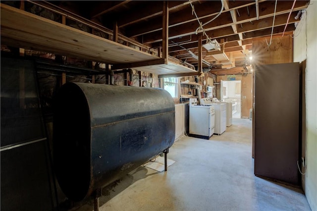 123 S Comstock Pkwy, Cranston, RI 02921 - below grade area featuring washer and clothes dryer and oil tank