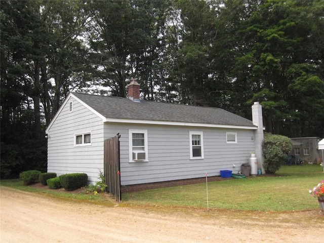 view of property exterior featuring a yard