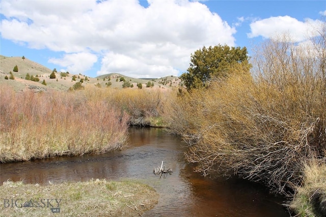 property view of water featuring a mountain view