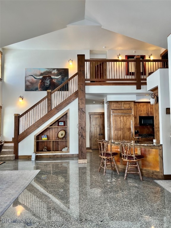 interior space featuring high vaulted ceiling