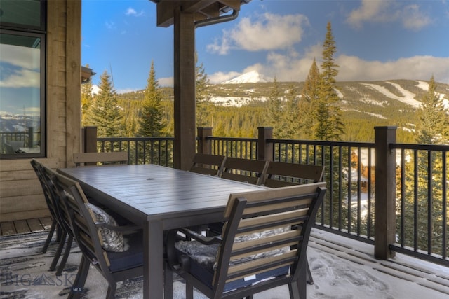 wooden deck featuring a mountain view