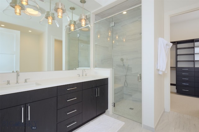 bathroom with vanity and walk in shower