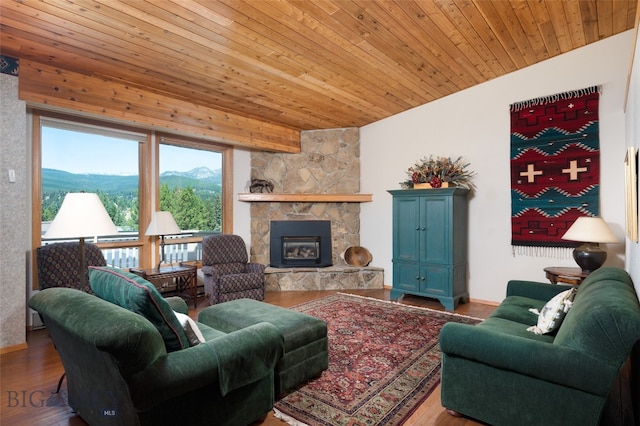 living room with wood ceiling, wood-type flooring, and a fireplace