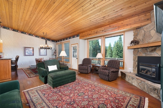 living room featuring a stone fireplace, dark wood-type flooring, wood ceiling, and an inviting chandelier