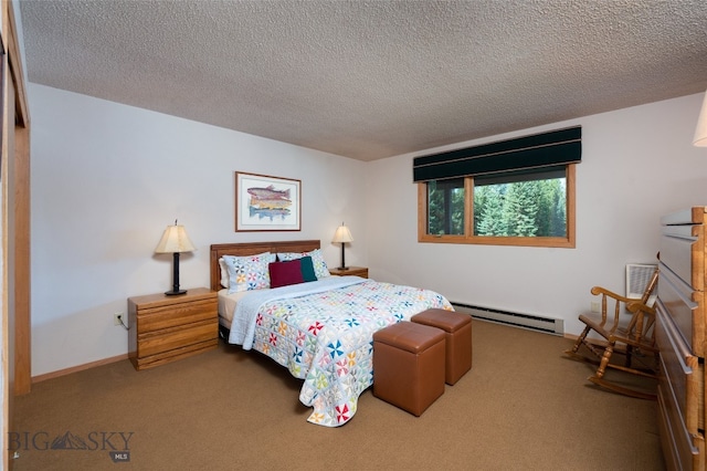 bedroom with baseboard heating, a textured ceiling, and carpet