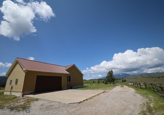 exterior space with a rural view