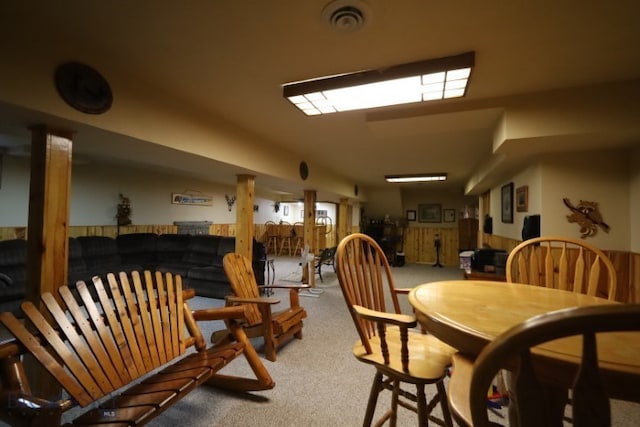 dining space with carpet