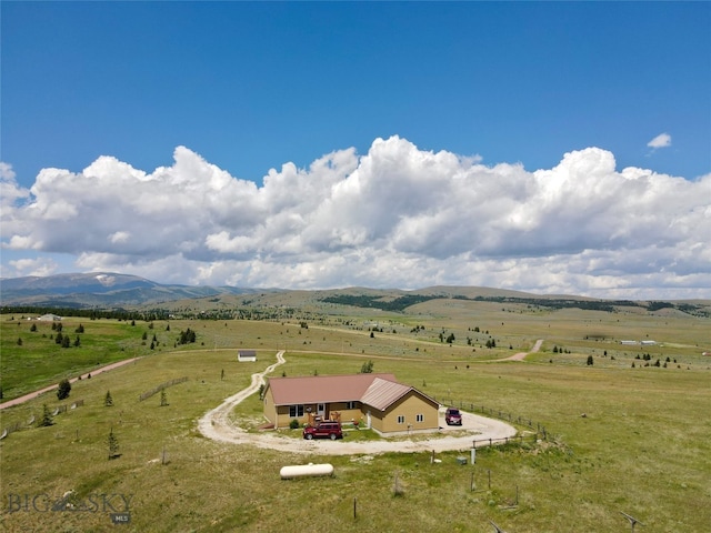 birds eye view of property featuring a rural view and a mountain view