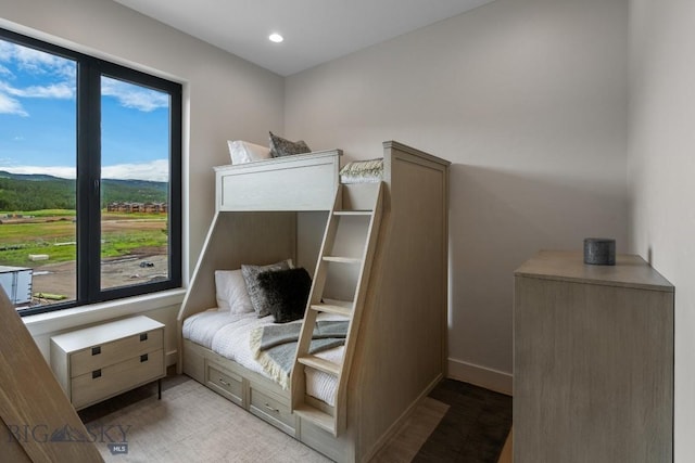 bedroom with multiple windows