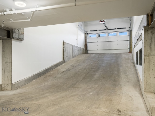 211 Town Center Ave Unit 2D, Big Sky, MT 59716 - garage with a garage door opener