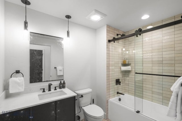 211 Town Center Ave Unit 2G, Big Sky, MT 59716 - bathroom with enclosed tub / shower combo, toilet, vanity, and recessed lighting