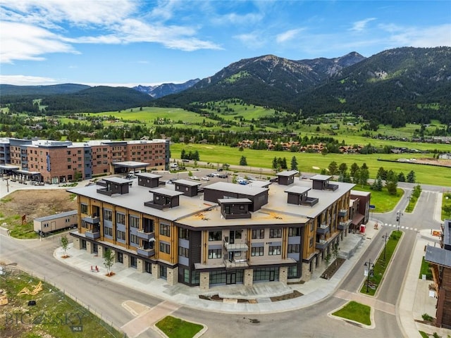 drone / aerial view featuring a mountain view