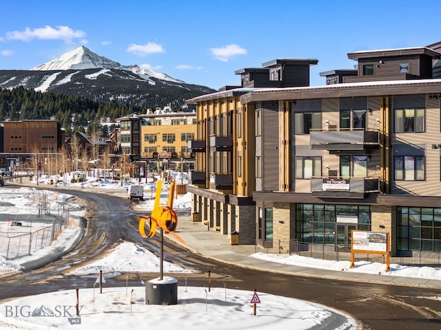 view of community with a mountain view