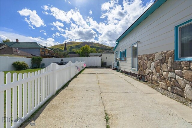 413 E 4th St, Anaconda, MT 59711 - view of side of property with a mountain view