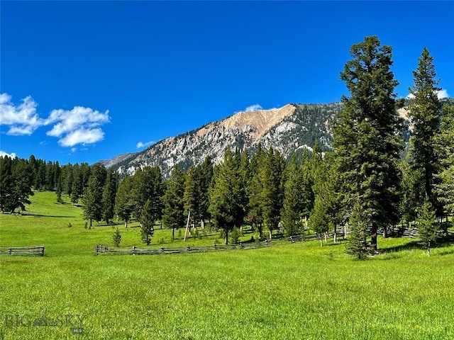 view of mountain feature with a rural view