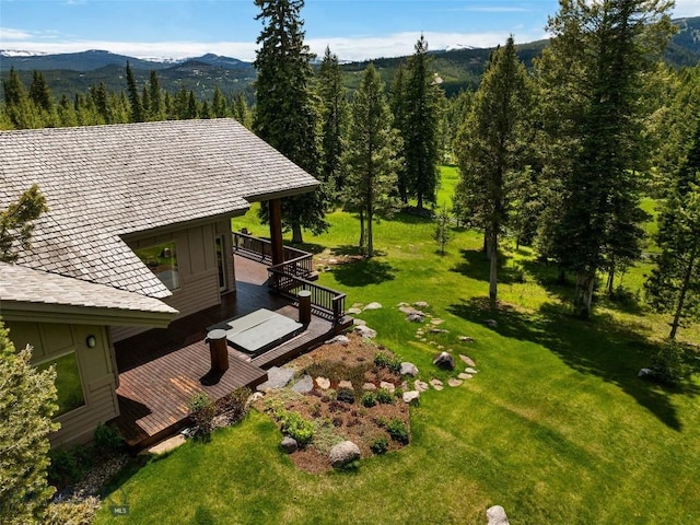 birds eye view of property featuring a mountain view