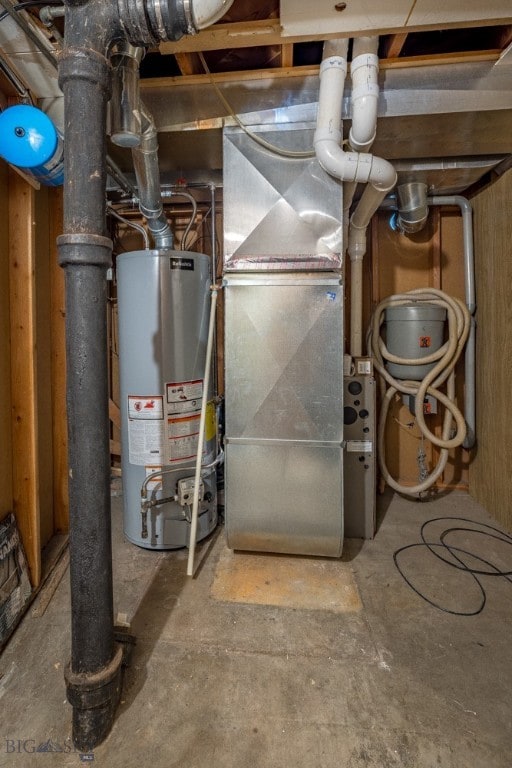 utility room featuring gas water heater