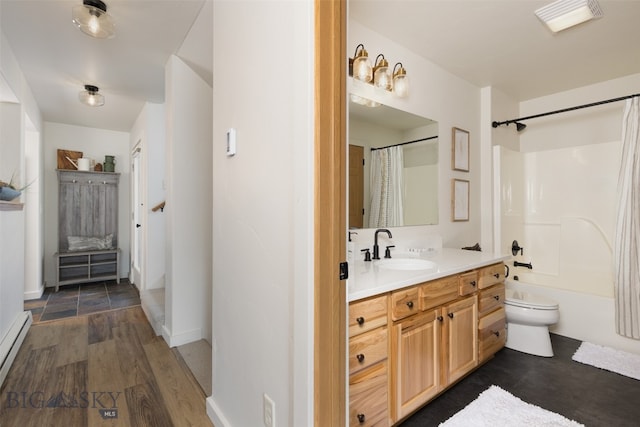 full bathroom featuring vanity, a baseboard heating unit, hardwood / wood-style flooring, toilet, and shower / bathtub combination with curtain