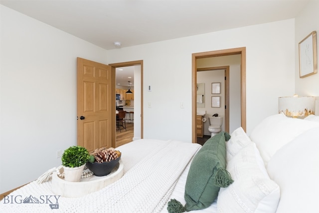 bedroom with connected bathroom