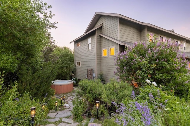 view of property exterior at dusk