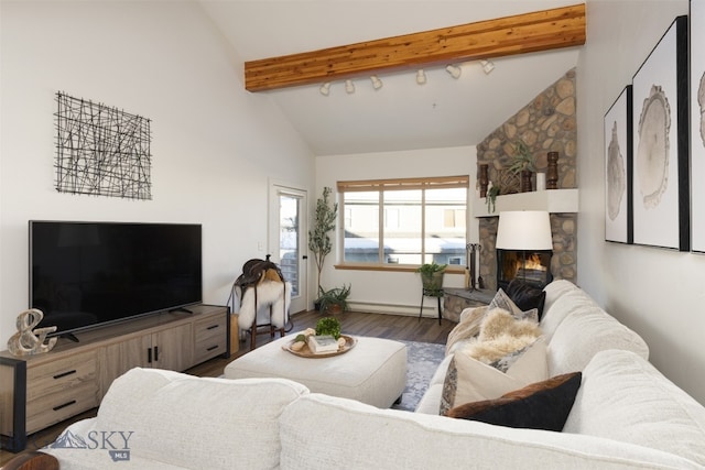 living room with beamed ceiling, high vaulted ceiling, a stone fireplace, and dark wood-type flooring