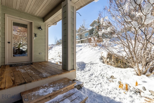 view of snow covered deck