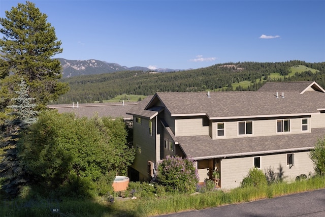 exterior space featuring a mountain view