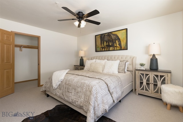 bedroom featuring light colored carpet and ceiling fan