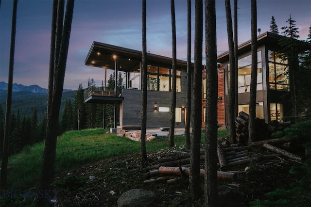 view of home's exterior with a mountain view