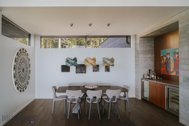 dining space with a bar, wine cooler, floor to ceiling windows, and dark wood-type flooring