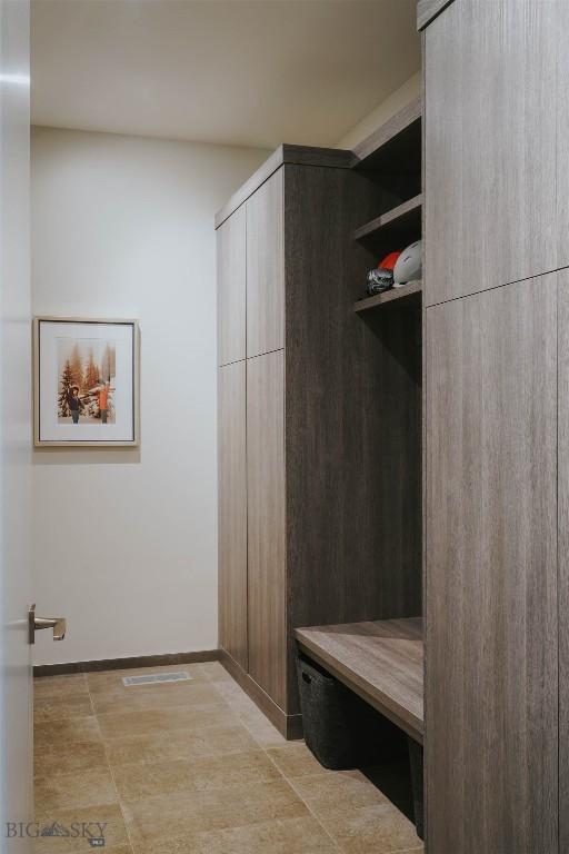 mudroom featuring baseboards