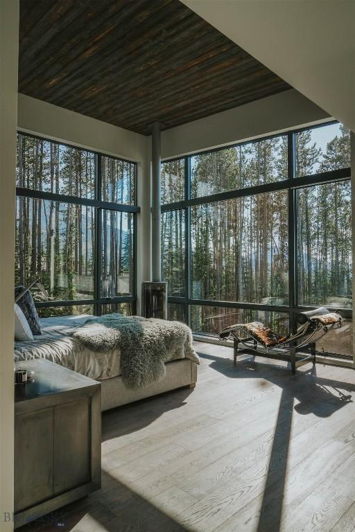 sunroom with wooden ceiling