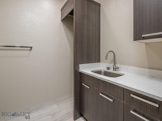 laundry area with sink