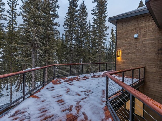 view of snow covered deck