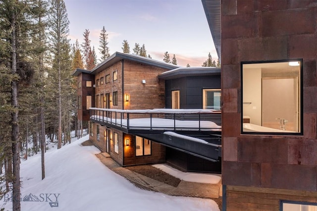 view of snow covered property