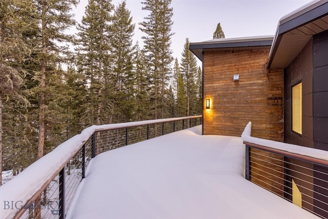 view of snow covered deck