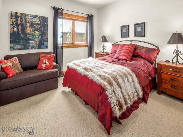 bedroom with light carpet