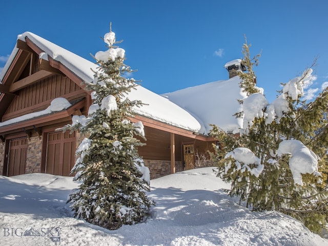 view of snow covered property