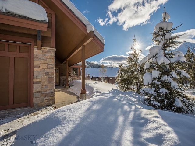 view of snow covered patio