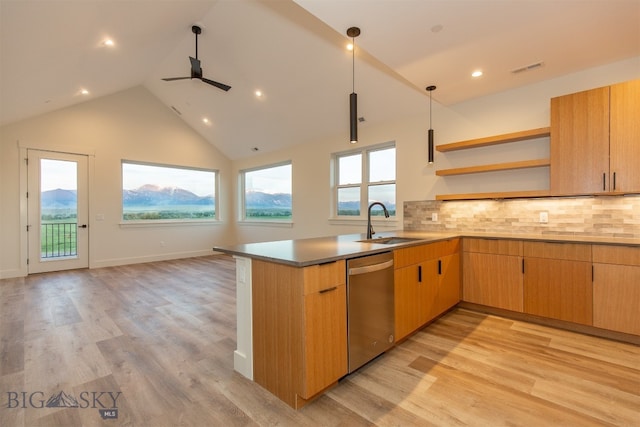 kitchen with light hardwood / wood-style flooring, sink, kitchen peninsula, decorative backsplash, and dishwasher