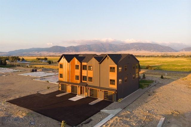 view of front of home with a mountain view