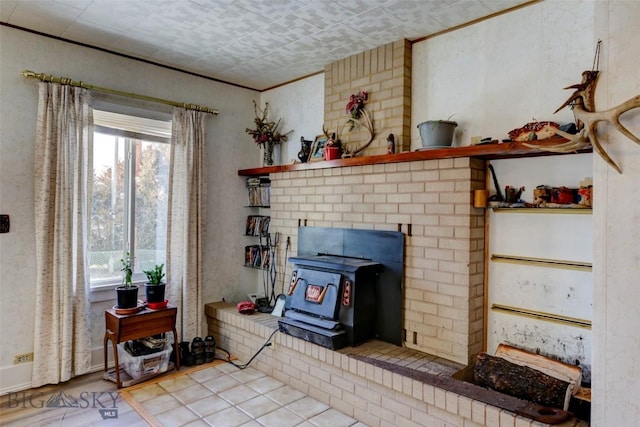 49 Two Dot Hwy, Harlowton, MT 59085 - living room with a wood stove, a wealth of natural light, and wood finished floors
