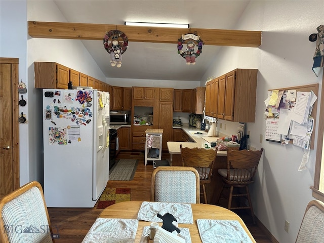 kitchen featuring white fridge with ice dispenser, dark hardwood / wood-style floors, vaulted ceiling with beams, and sink