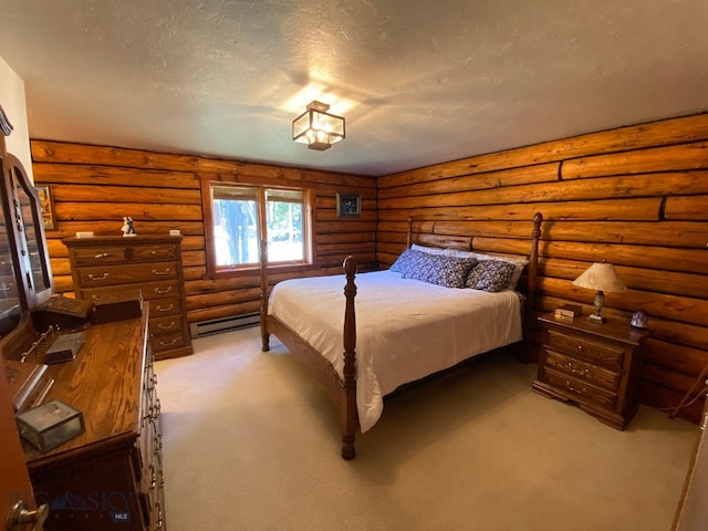 carpeted bedroom with rustic walls, a baseboard radiator, and a textured ceiling