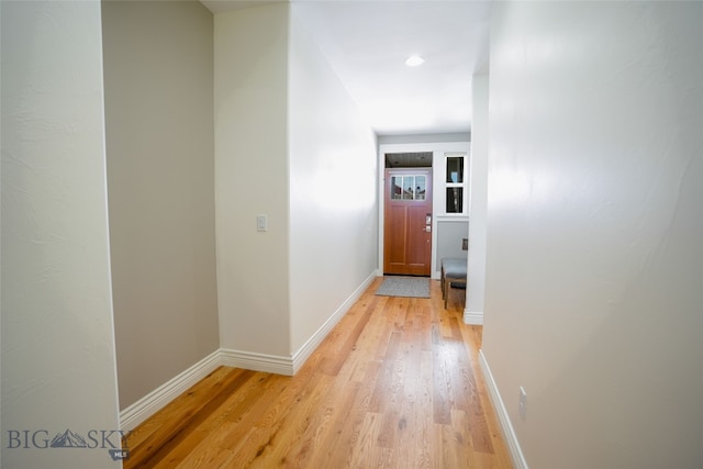 hallway featuring light hardwood / wood-style flooring