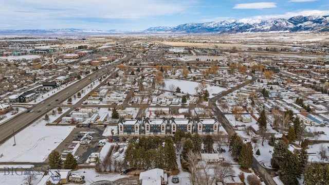 907 N 17th Ave, Bozeman, MT 59715 - snowy aerial view with a mountain view and a residential view