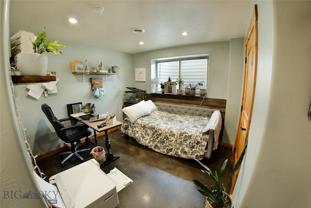 bedroom with concrete flooring