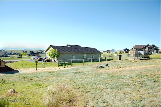 view of yard with a trampoline