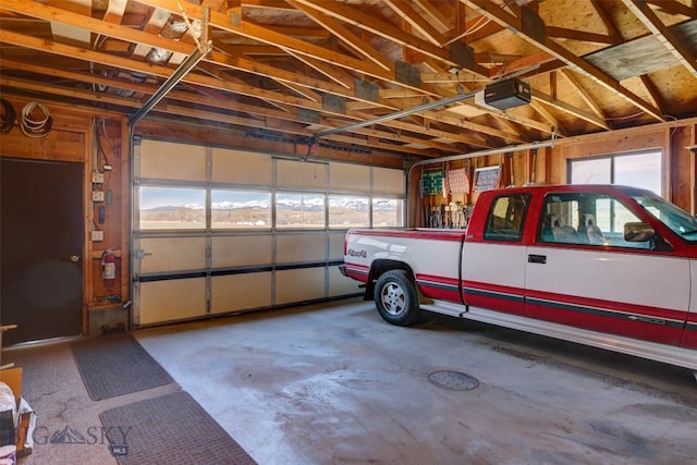 garage featuring a garage door opener